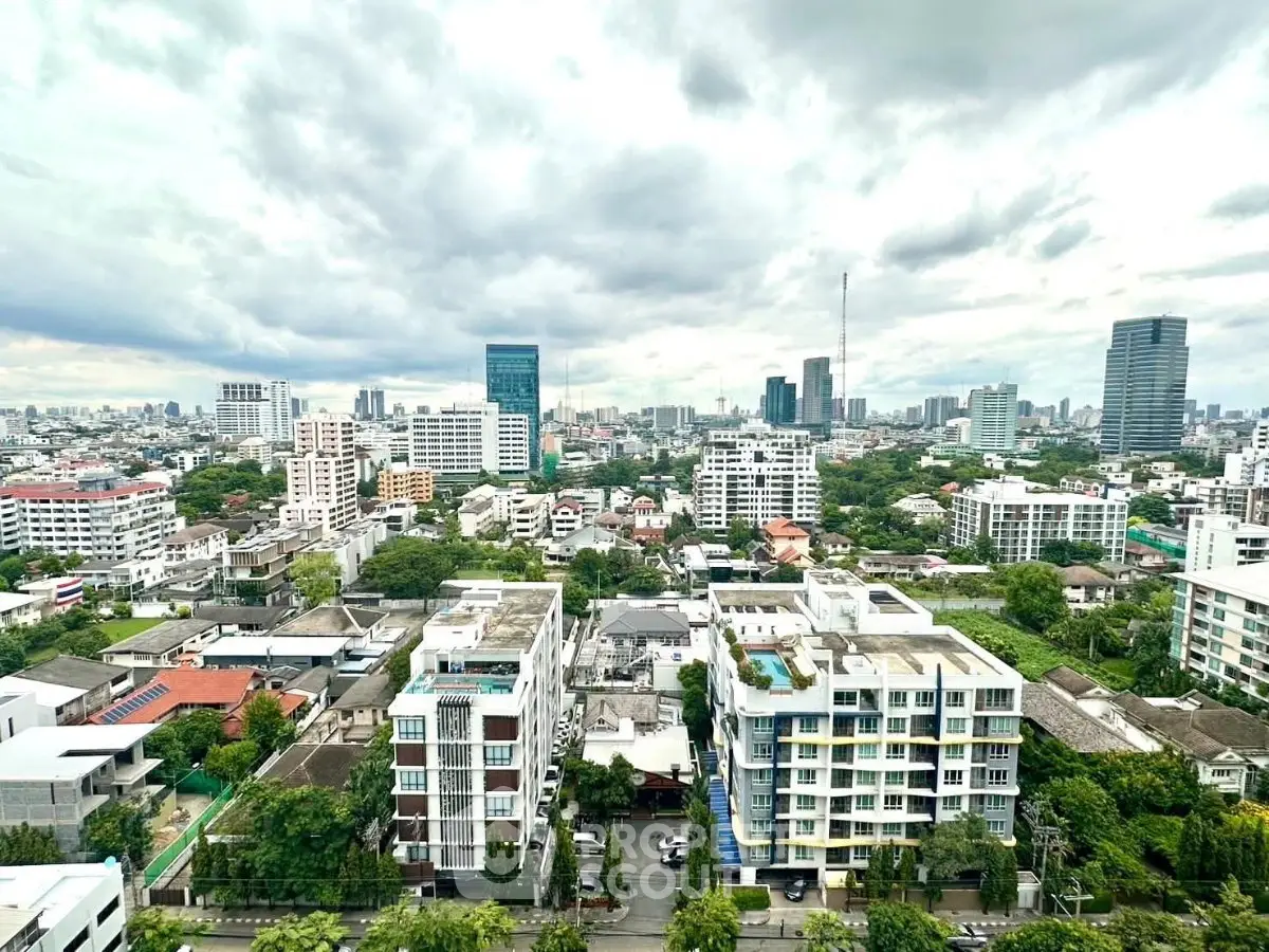 Stunning cityscape view showcasing modern urban skyline and lush greenery.