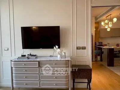 Elegant living room with modern TV setup and stylish decor