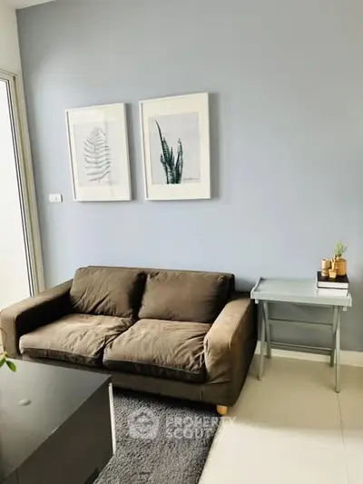 Cozy living room with modern decor and comfortable sofa