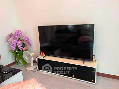 Modern living room with sleek TV setup and stylish decor