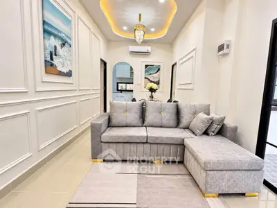 Elegant living room with modern gray sofa and stylish decor