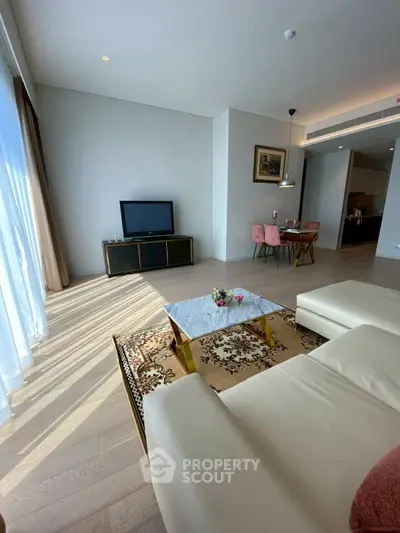 Spacious modern living room with elegant decor and natural light