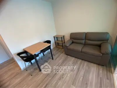 Cozy living room with modern furniture and wooden flooring