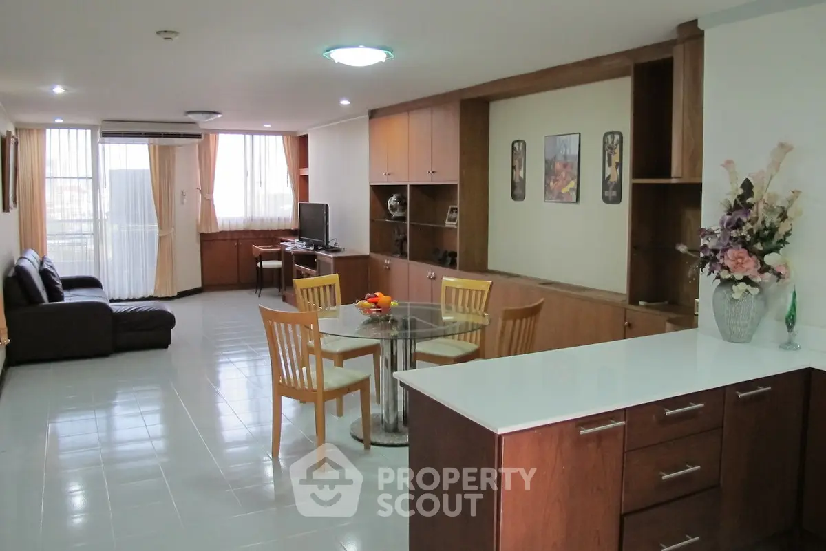 Spacious open-plan living room with modern furniture and elegant decor