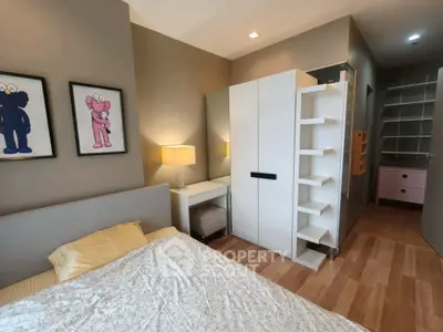 Cozy bedroom with modern decor and ample storage space
