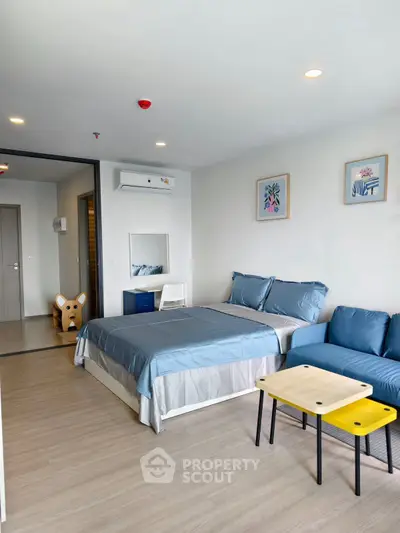 Modern studio apartment with stylish decor and cozy furnishings