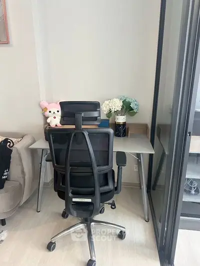 Modern home office setup with ergonomic chair and stylish decor