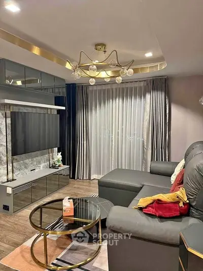 Luxurious living room with modern decor and elegant lighting