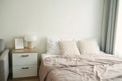 Cozy bedroom with modern decor and natural light