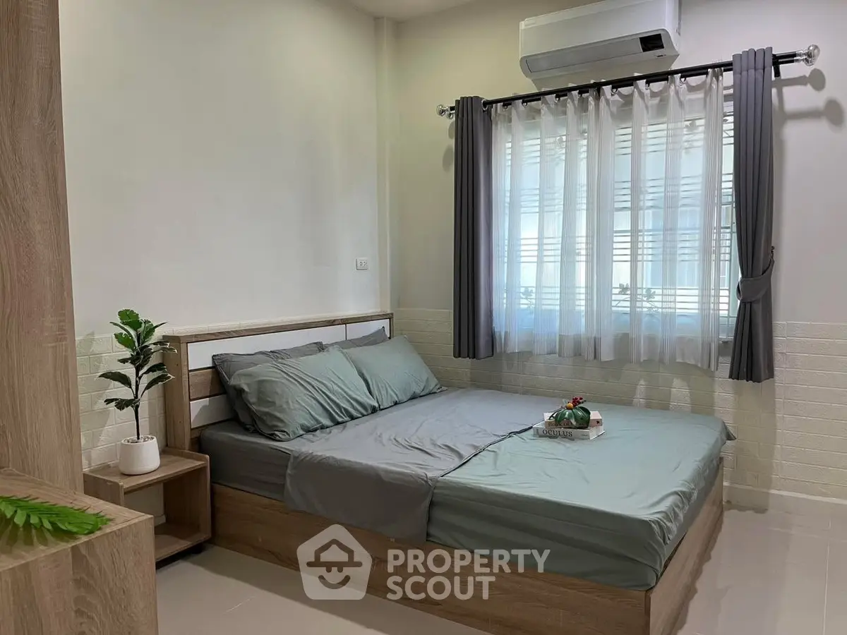 Cozy bedroom with modern decor and natural light