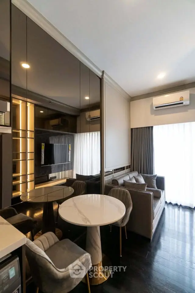 Luxurious modern living room with elegant decor and ample natural light