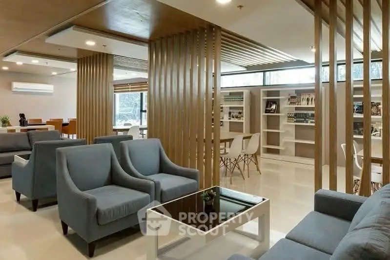 Modern and spacious co-working space with stylish seating and natural light.