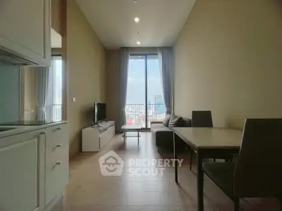 Modern living room with city view, featuring sleek furniture and open layout for stylish urban living.