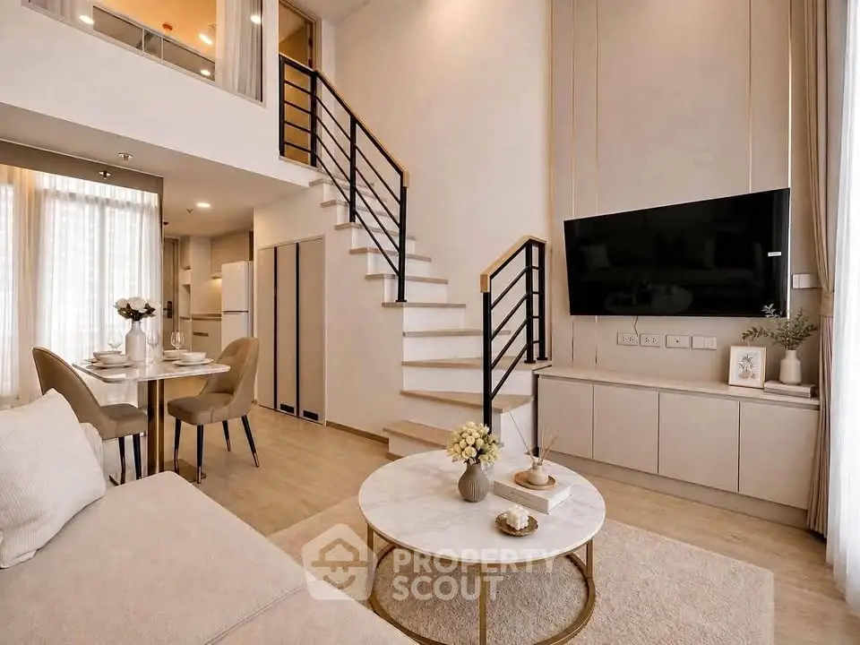 Modern duplex living room with elegant staircase and stylish decor
