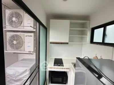 Compact modern kitchen with sleek appliances and efficient layout