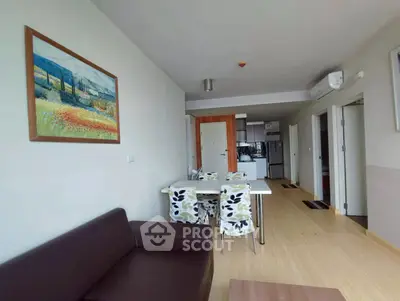 Modern living room with open kitchen and stylish decor