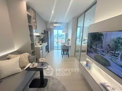 Modern living room with open kitchen and balcony view in a stylish apartment