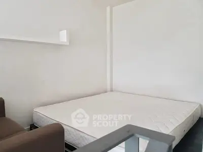 Minimalist bedroom with mattress and modern decor