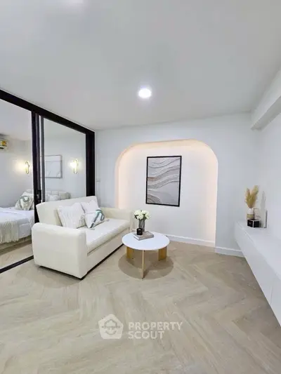 Modern living room with elegant decor and cozy seating area