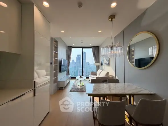 Modern living room with city view, elegant decor, and dining area in luxury apartment.