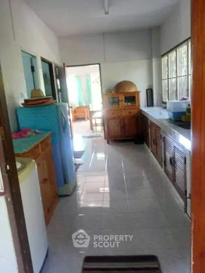 Charming kitchen with natural light and ample storage space