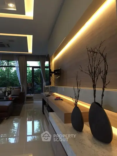Modern living room with elegant lighting and stylish decor