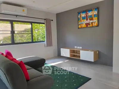 Modern living room with stylish decor and natural light