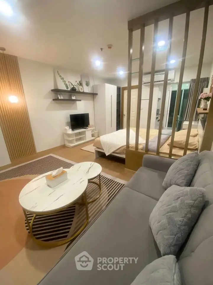Modern studio apartment with stylish decor and cozy living area