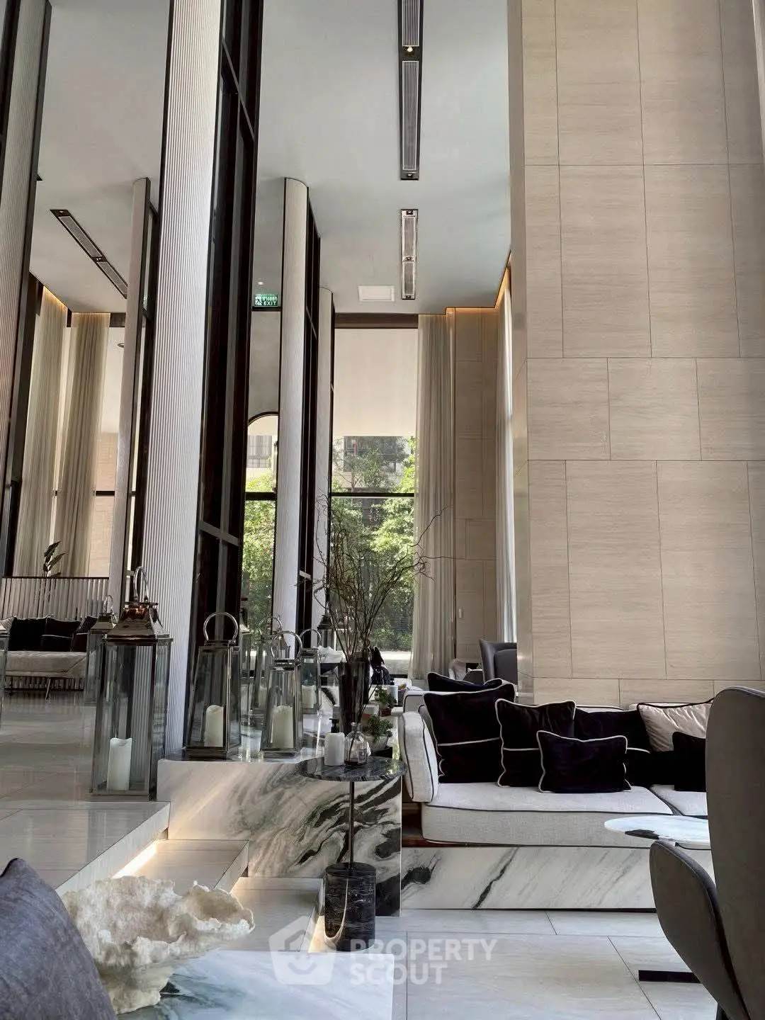 Luxurious modern living room with high ceilings and elegant decor