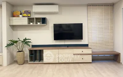 Modern living room with sleek TV unit and stylish decor