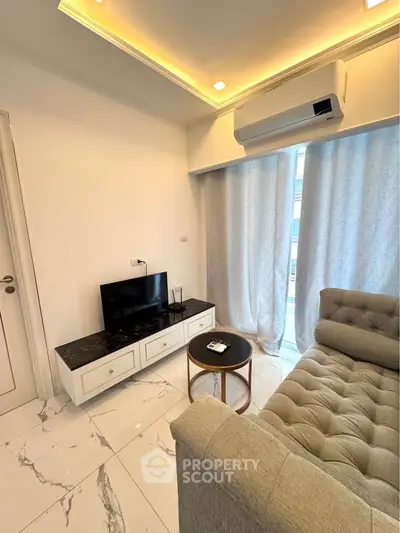 Modern living room with elegant marble flooring and stylish furniture