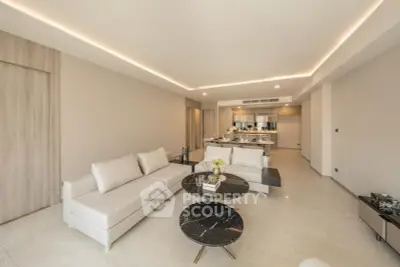Spacious modern living room with open kitchen and elegant decor