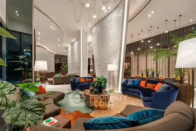 Luxurious modern living room with elegant decor and plush seating in a high-end real estate property.