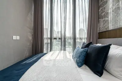 Luxurious bedroom with city view and elegant decor