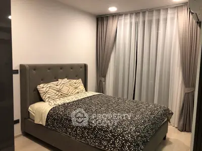 Cozy modern bedroom with elegant curtains and stylish bed