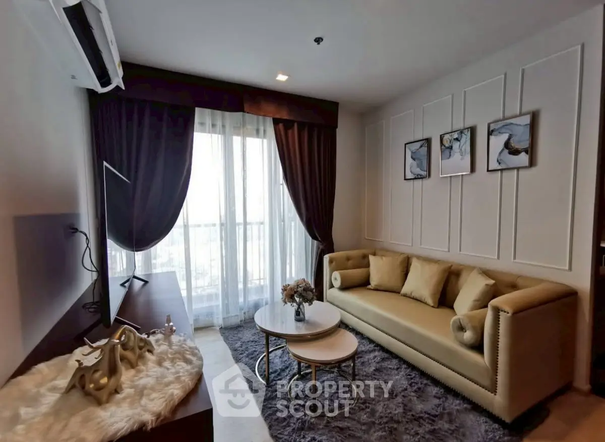 Luxurious living room with elegant decor and large window view