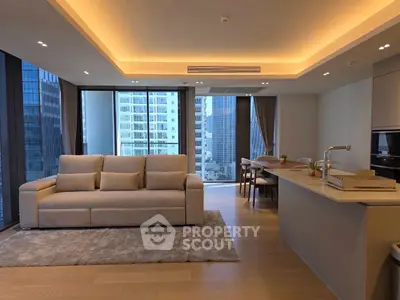 Luxurious modern living room with open kitchen and stunning city view