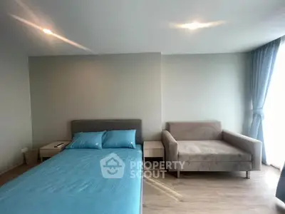 Modern bedroom with stylish furniture and natural light