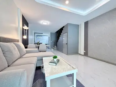 Spacious modern living room with elegant decor and cozy seating area