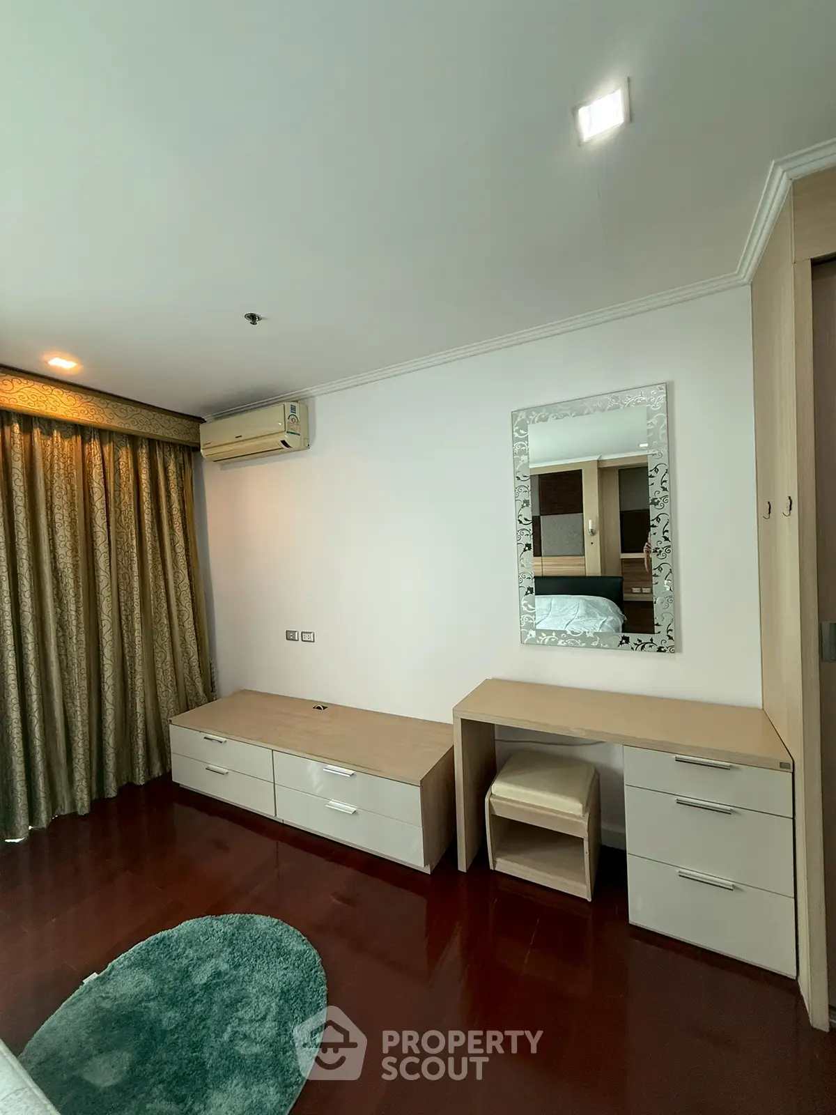 Spacious bedroom with elegant decor and modern furniture