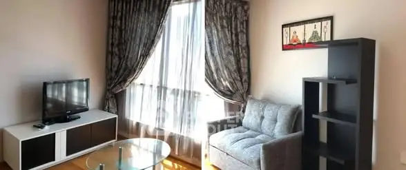 Cozy living room with modern decor and natural light