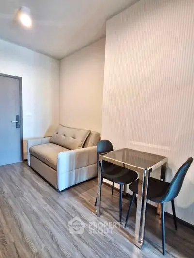 Modern living room with sleek furniture and stylish flooring