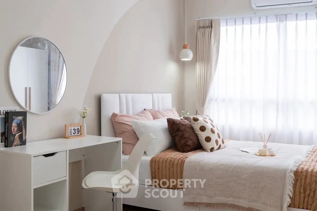 Cozy and stylish bedroom with modern decor and natural light