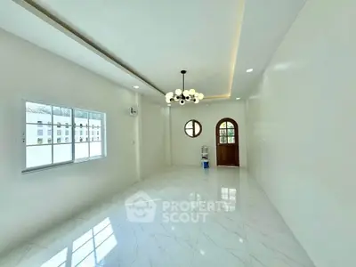 Spacious and bright living room with elegant lighting and modern design