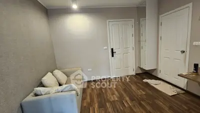 Cozy living room with modern decor and wooden flooring