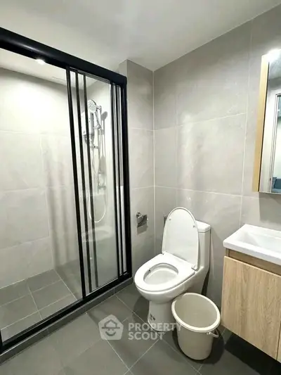 Modern bathroom with sleek shower and contemporary fixtures