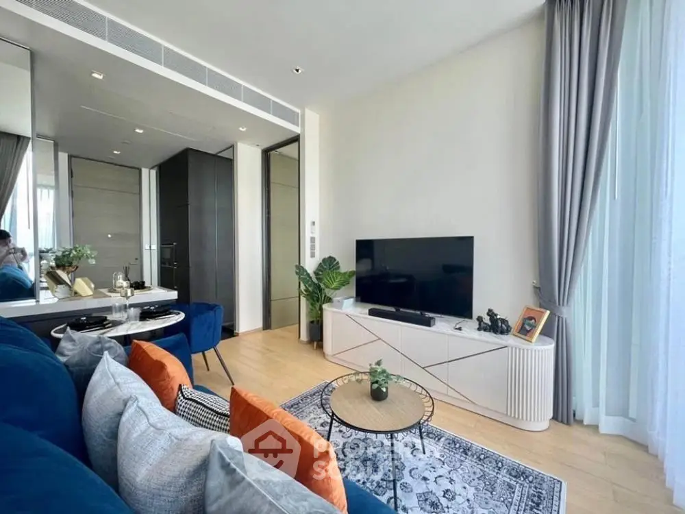 Stylish modern living room with elegant decor and large TV setup