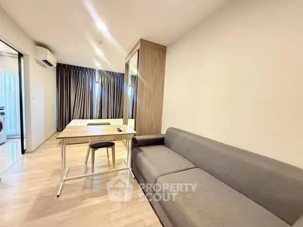 Modern living room with sleek furniture and natural light