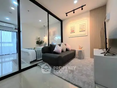 Modern living room with glass partition and cozy decor