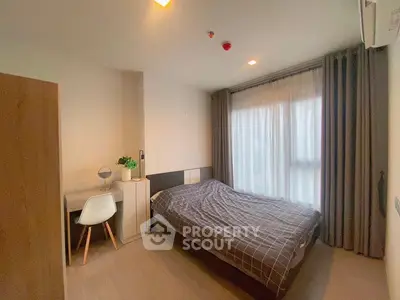 Cozy bedroom with modern decor and natural light